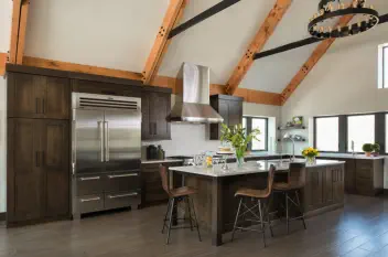 dark cabinets in kitchen in lakehouse