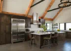 dark cabinets in kitchen in lakehouse